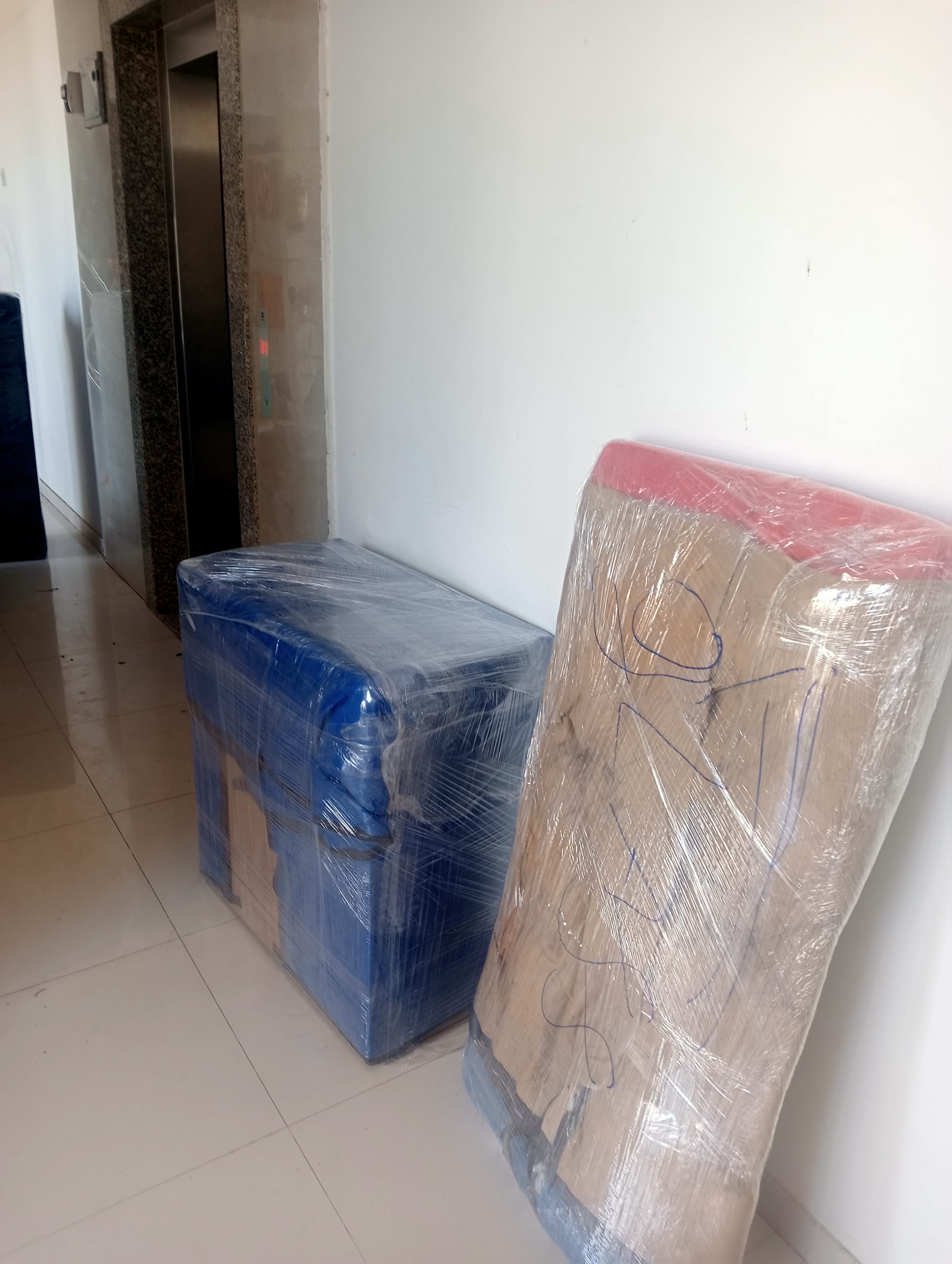 Loading a car onto a transport carrier