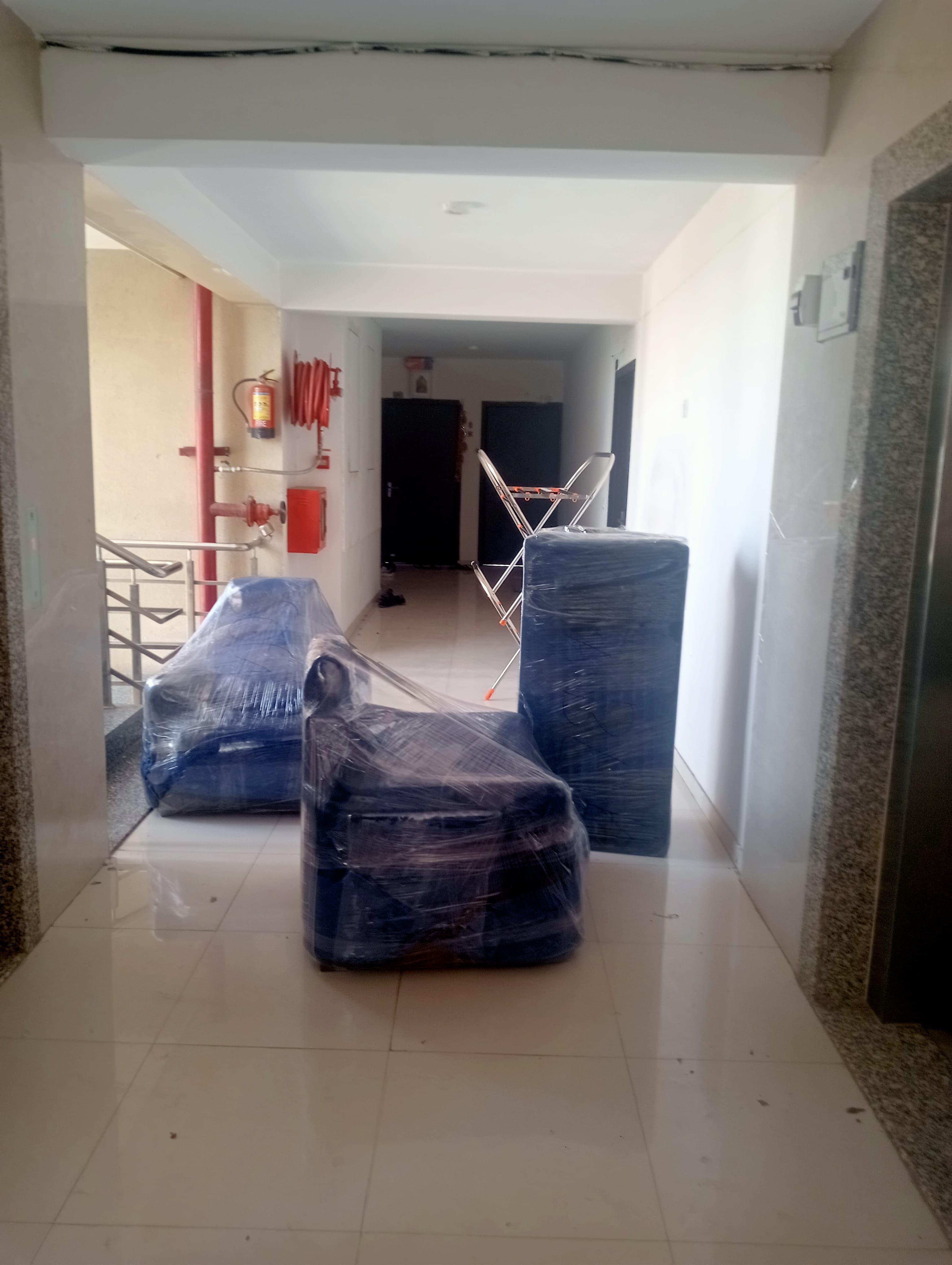 Team securing heavy furniture in the truck