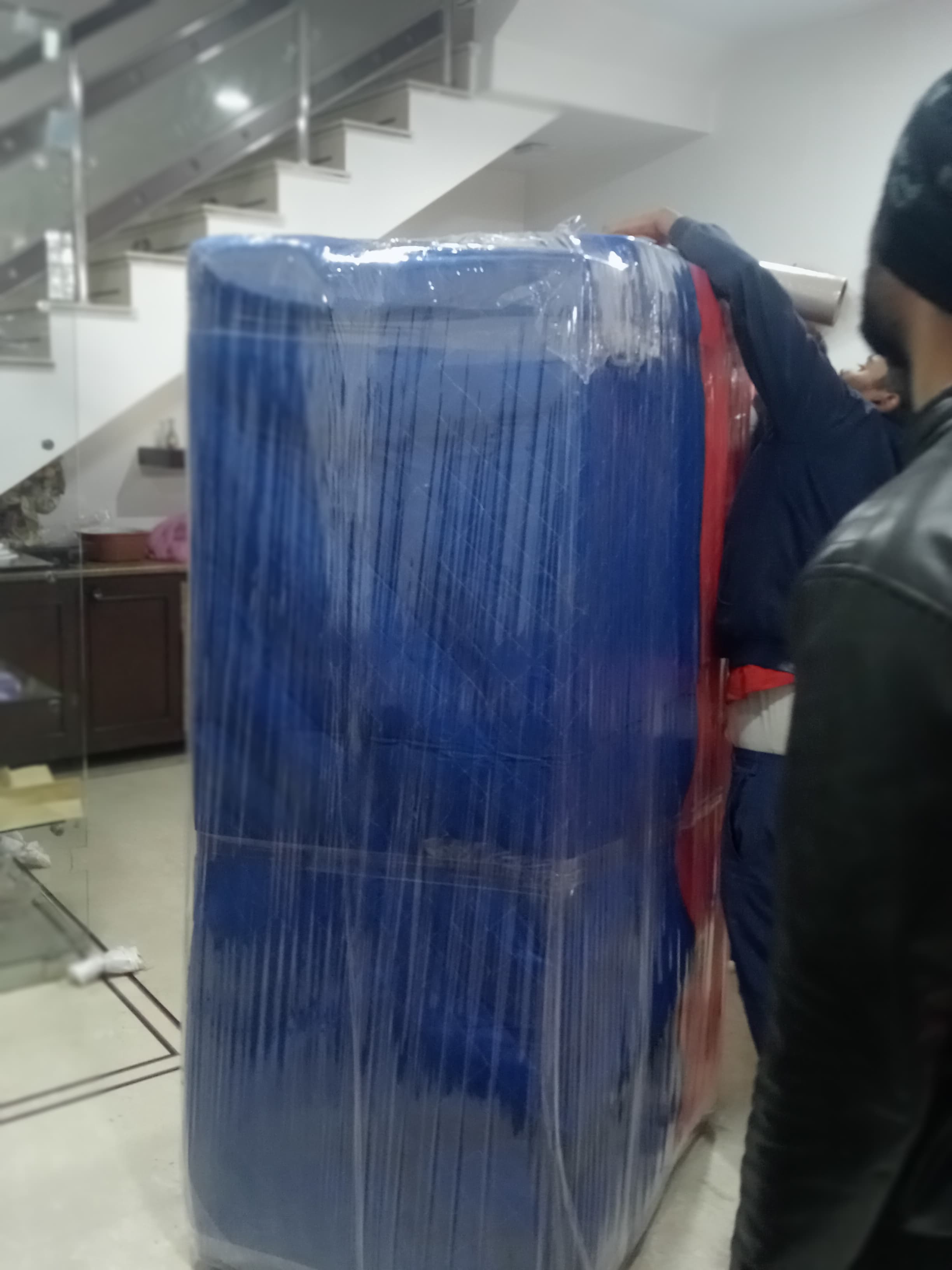 Moving truck parked outside a residential building