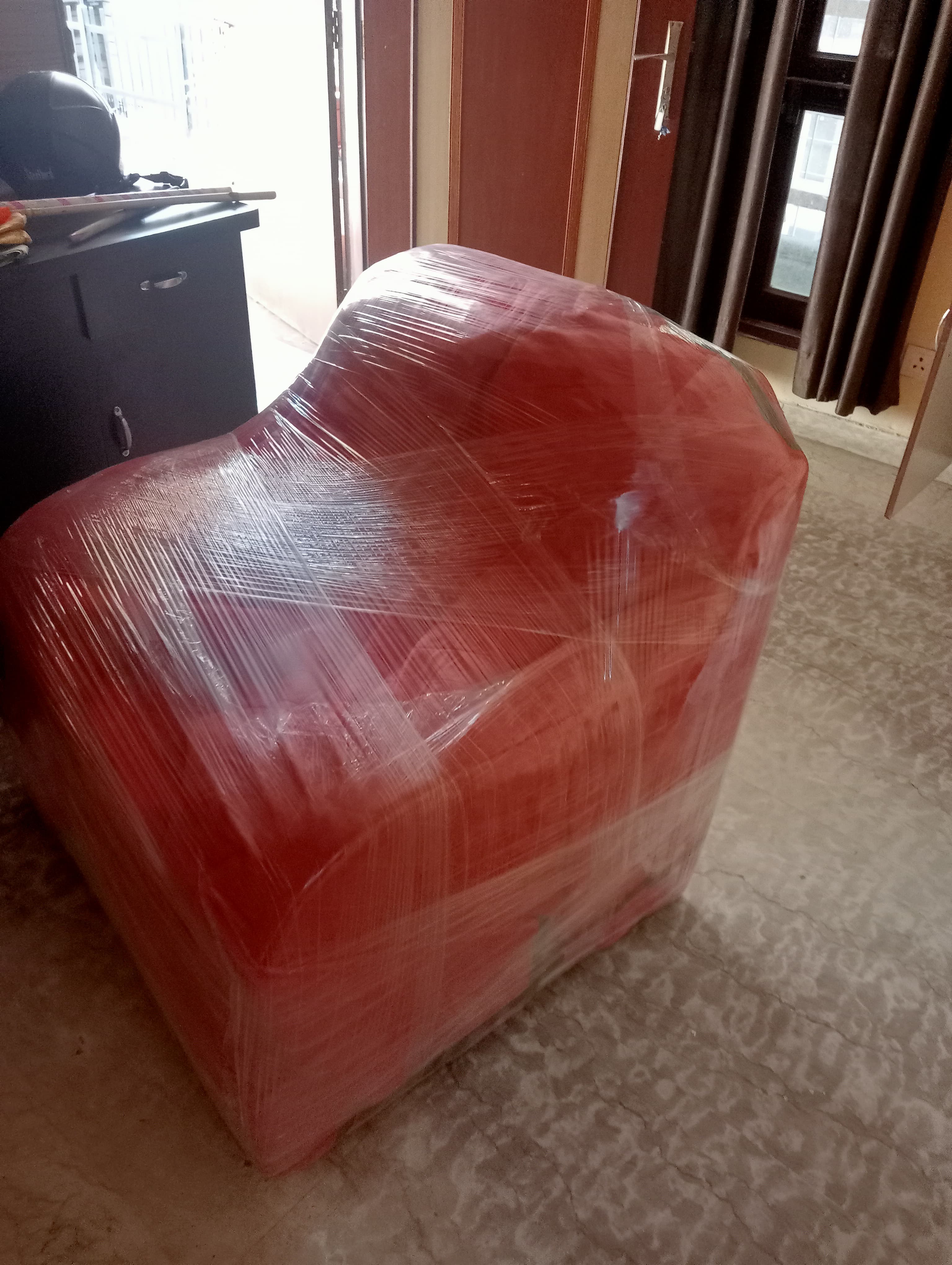 Keshav Packers and Movers team packing furniture with care