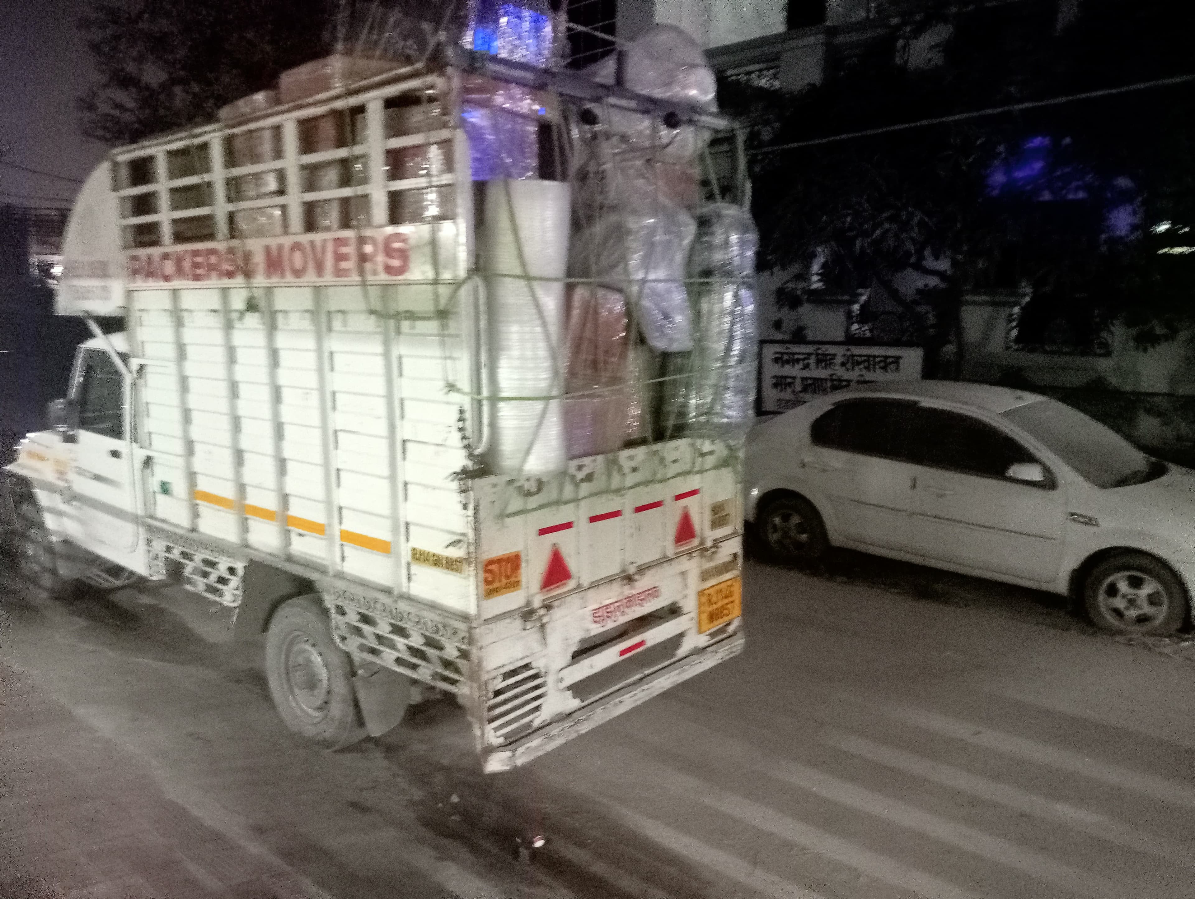 Team organizing a moving truck efficiently