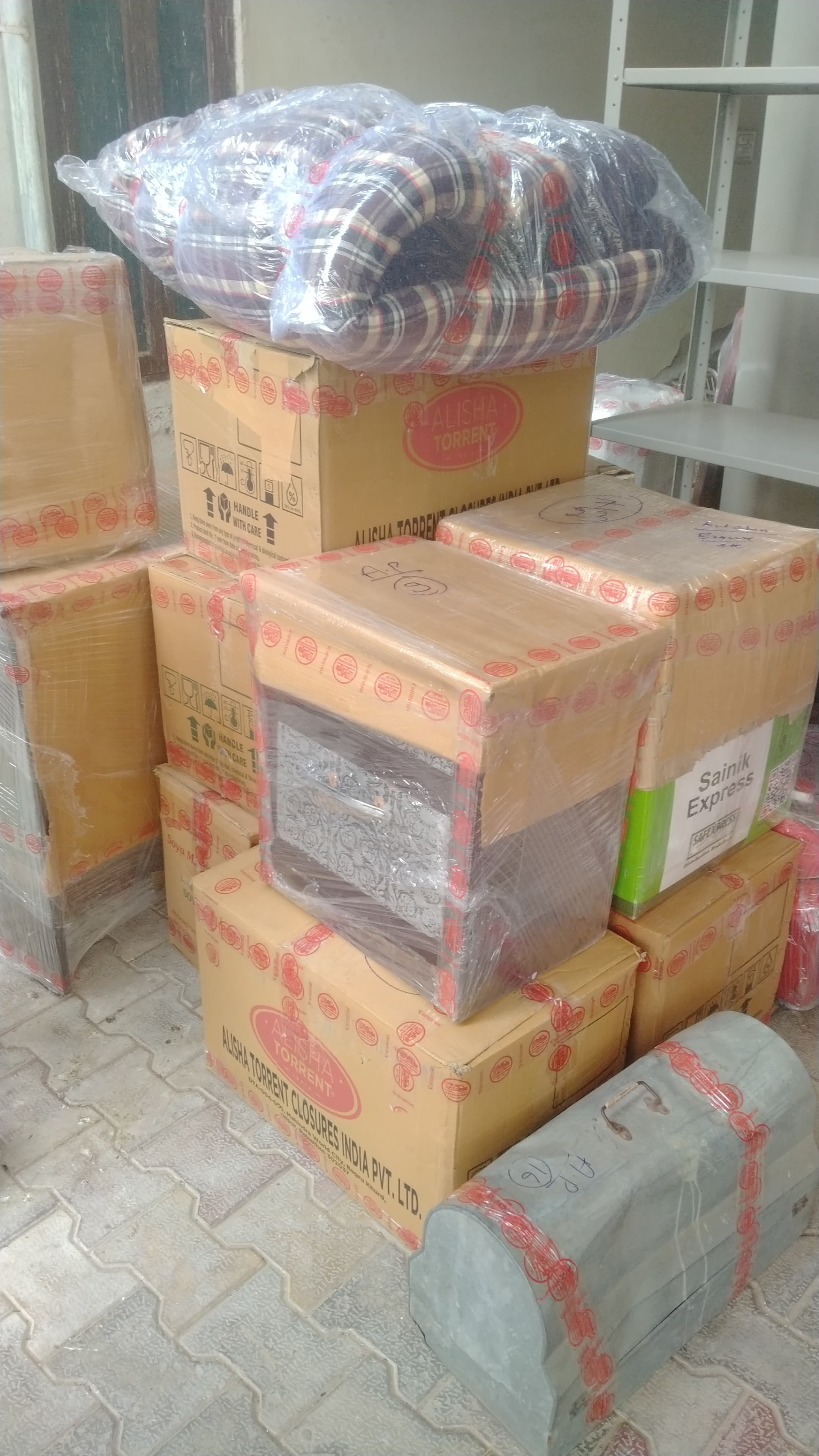 Family unpacking in new home with Keshav Packers and Movers assistance