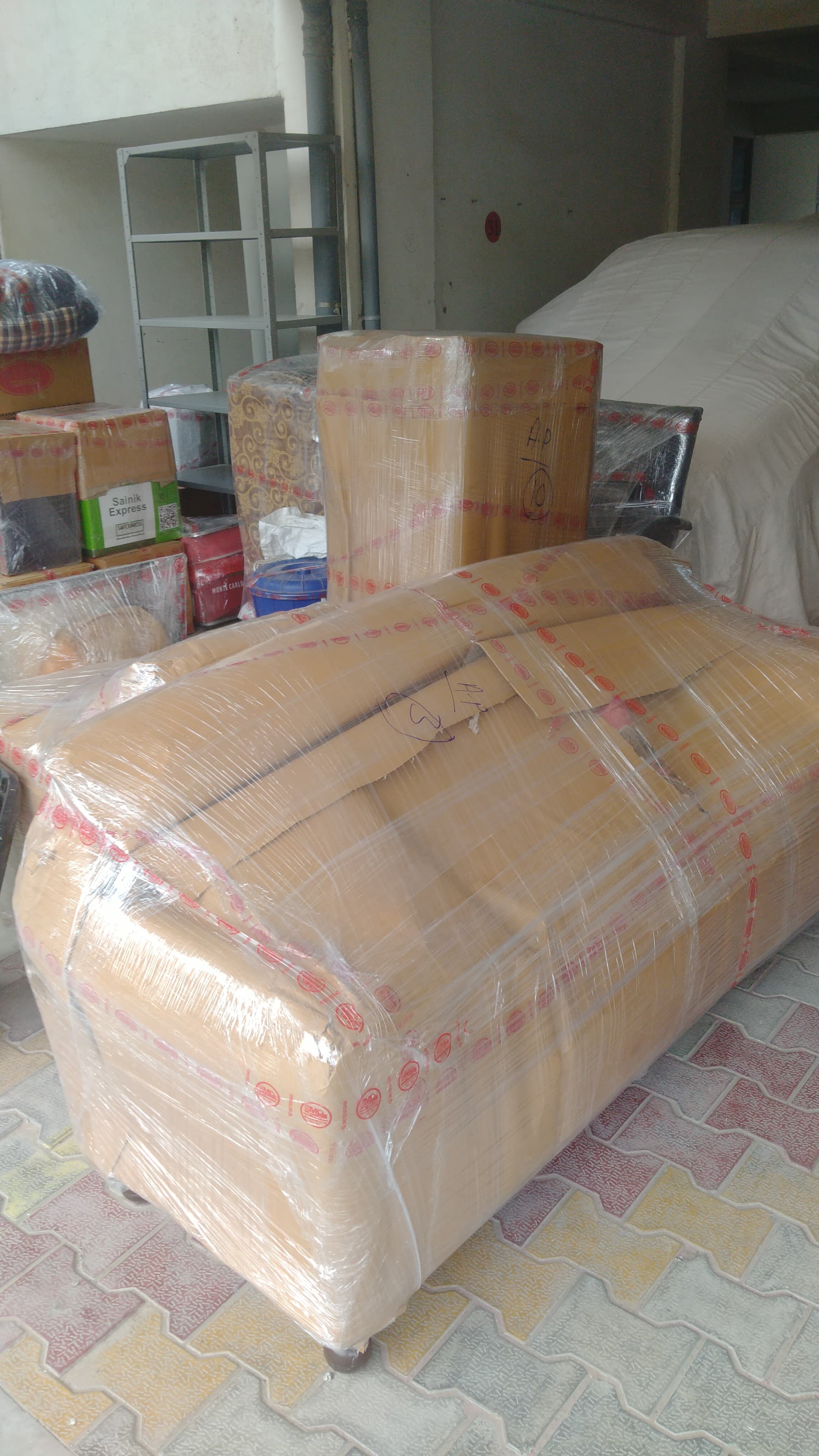 Bike being loaded for transport by Keshav Packers and Movers