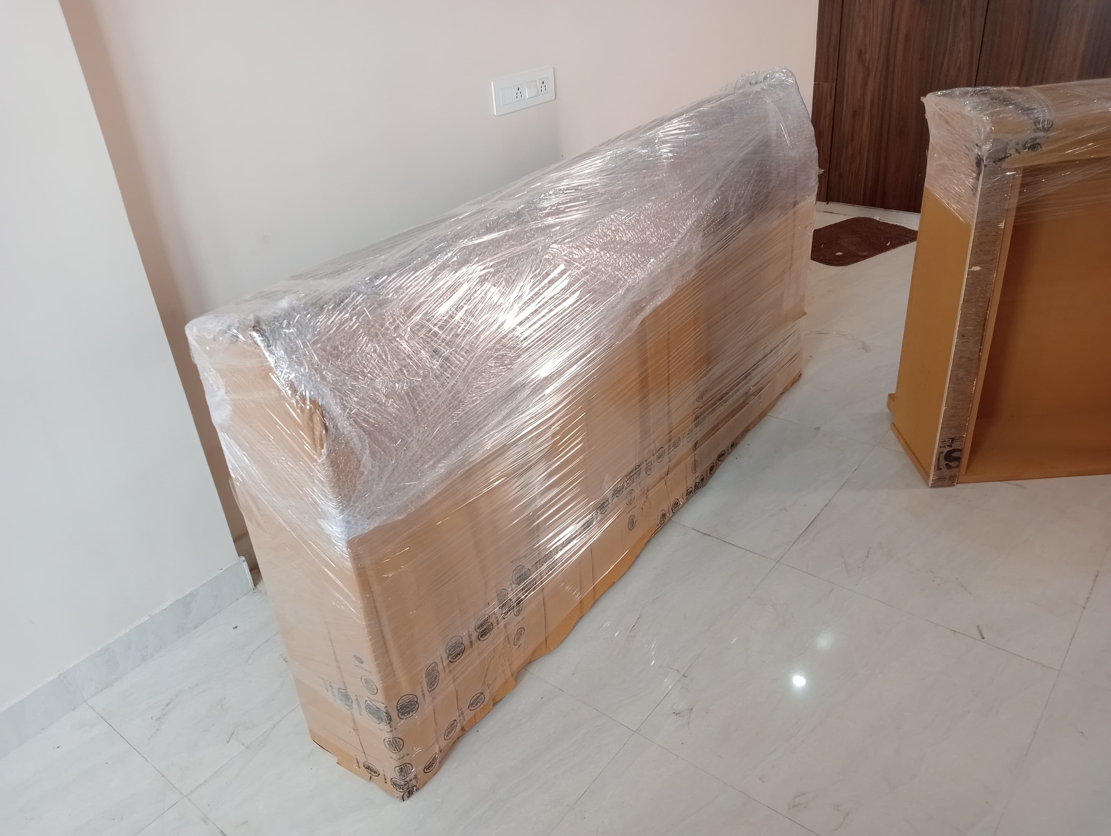 Office relocation team moving office chairs