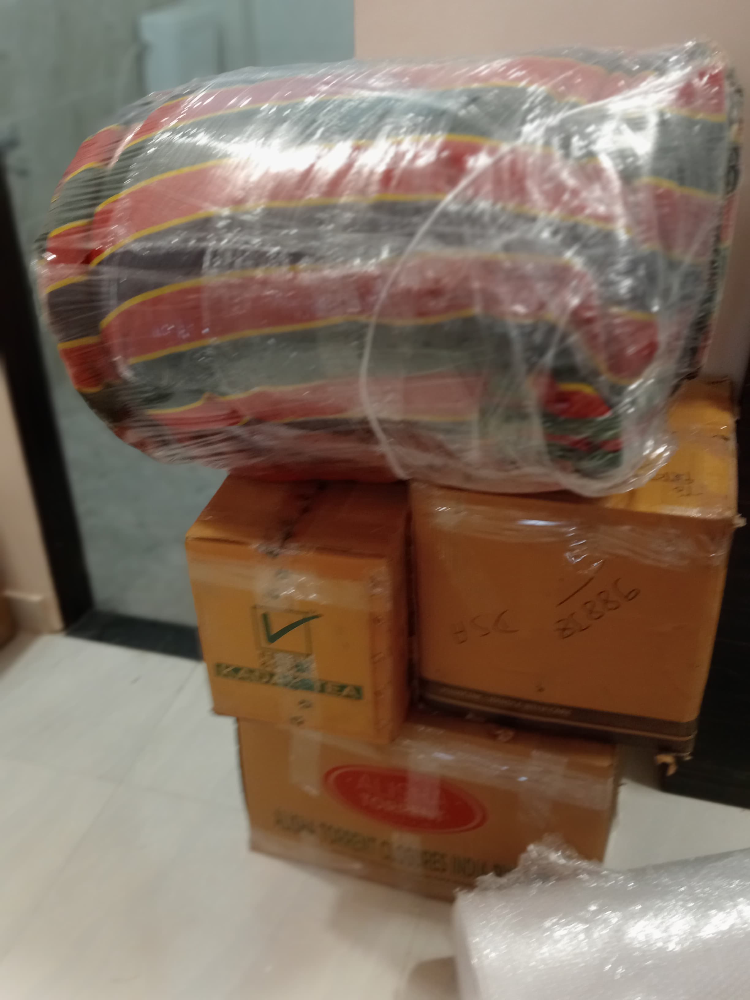 Unloading a washing machine at a new home