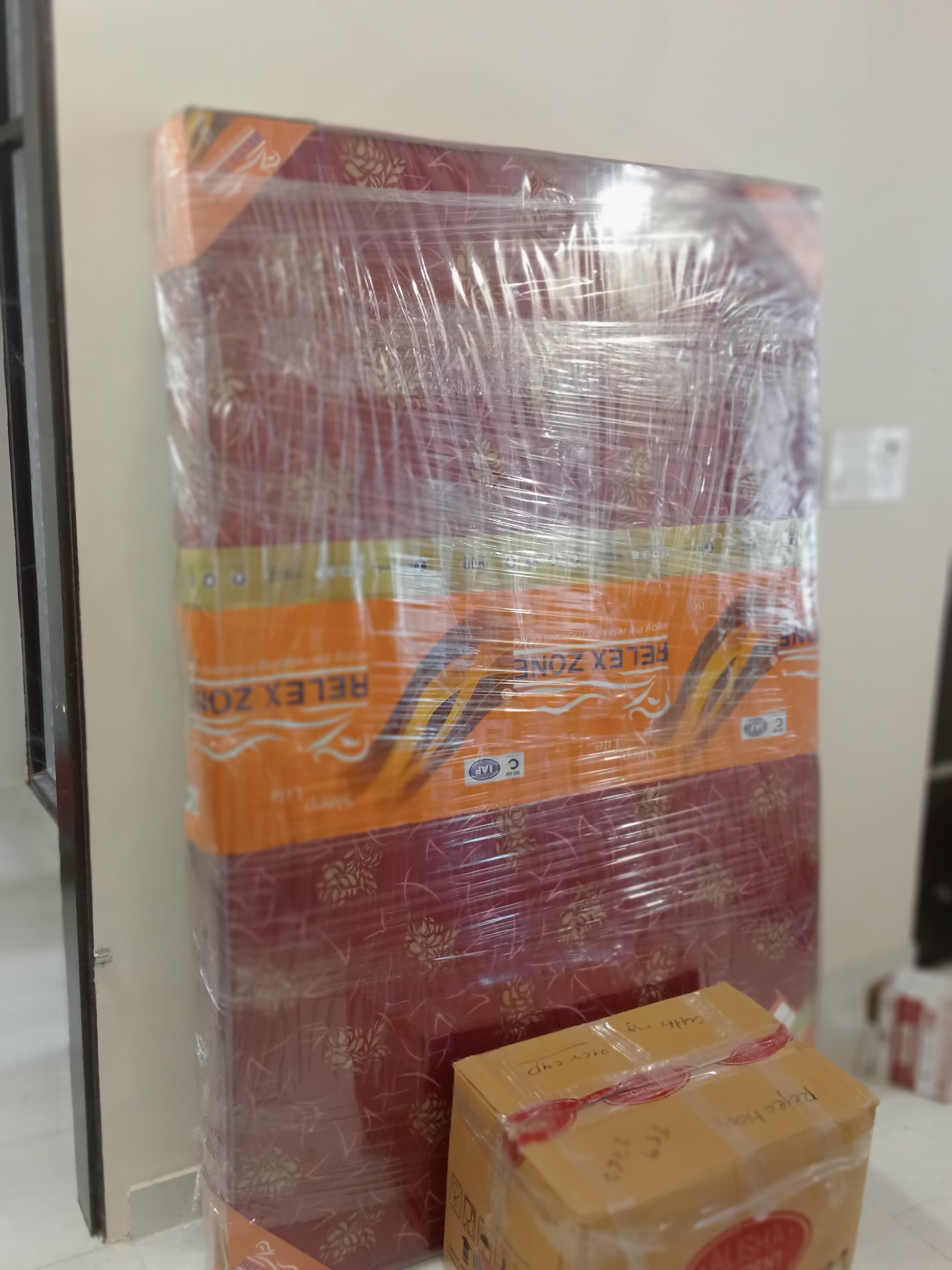 Unloading a sofa at a new residence