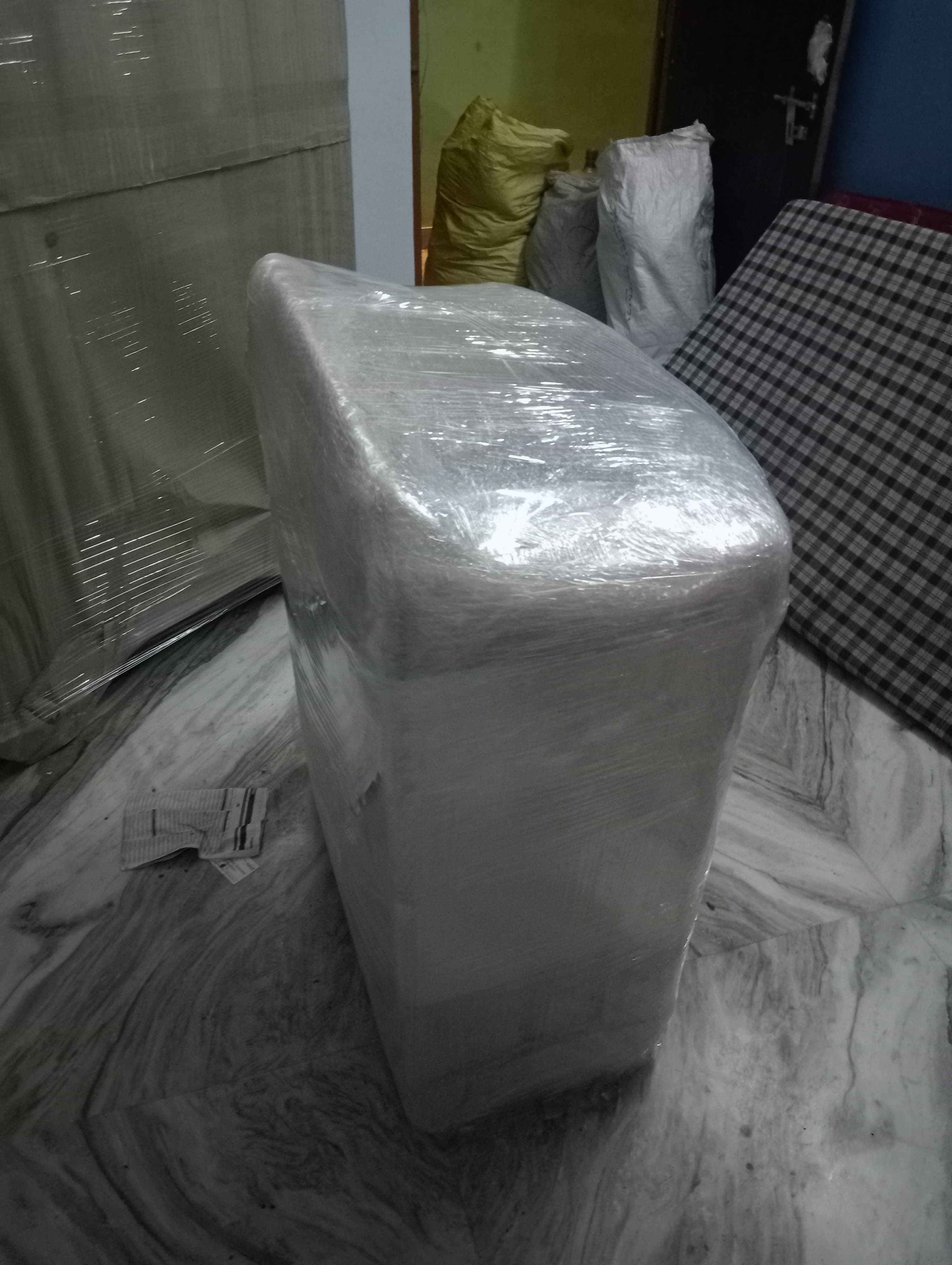 Office relocation team moving filing cabinets