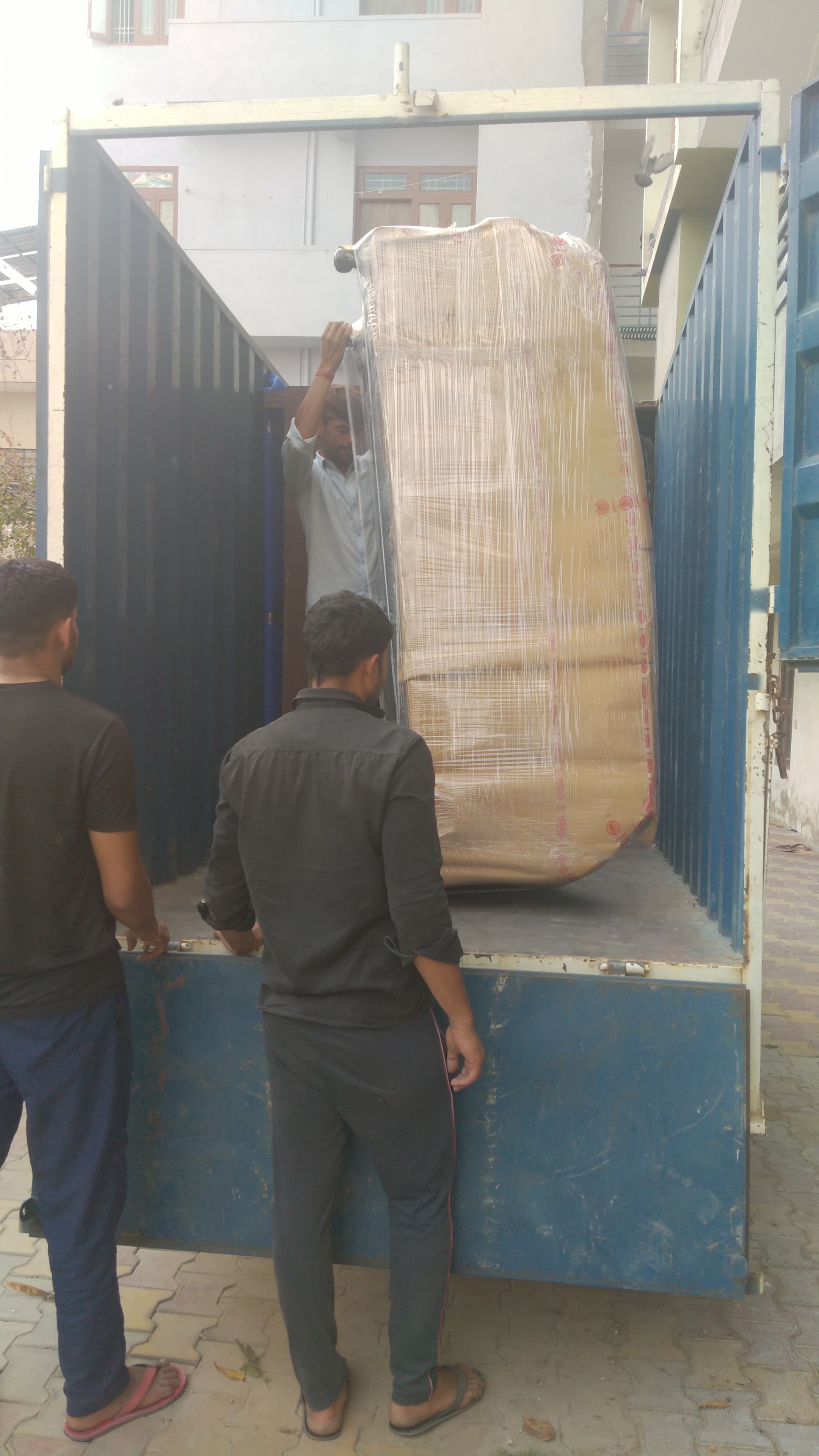 Keshav Packers and Movers team packing fragile items with care