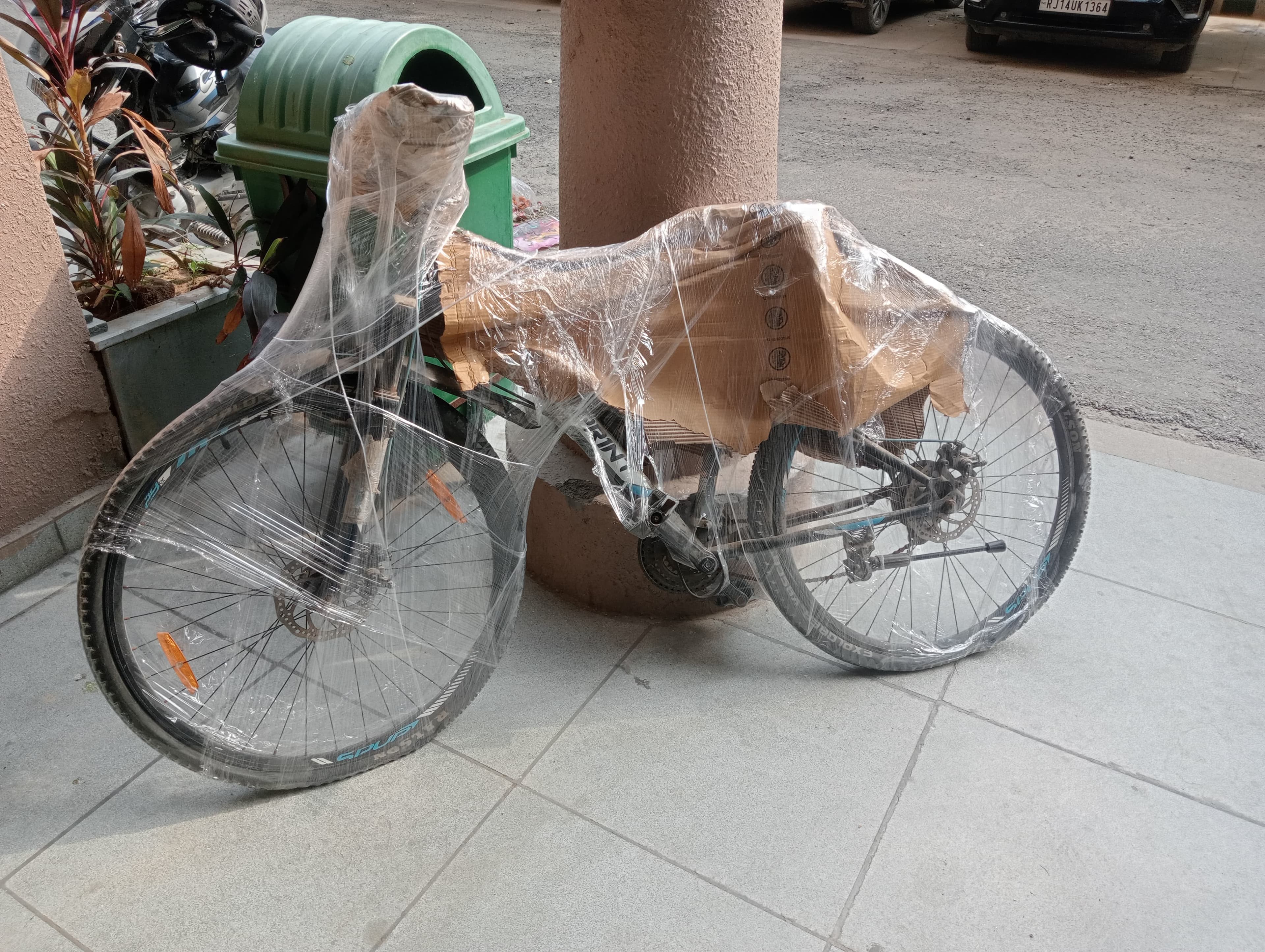Movers unpacking a wardrobe in a new home