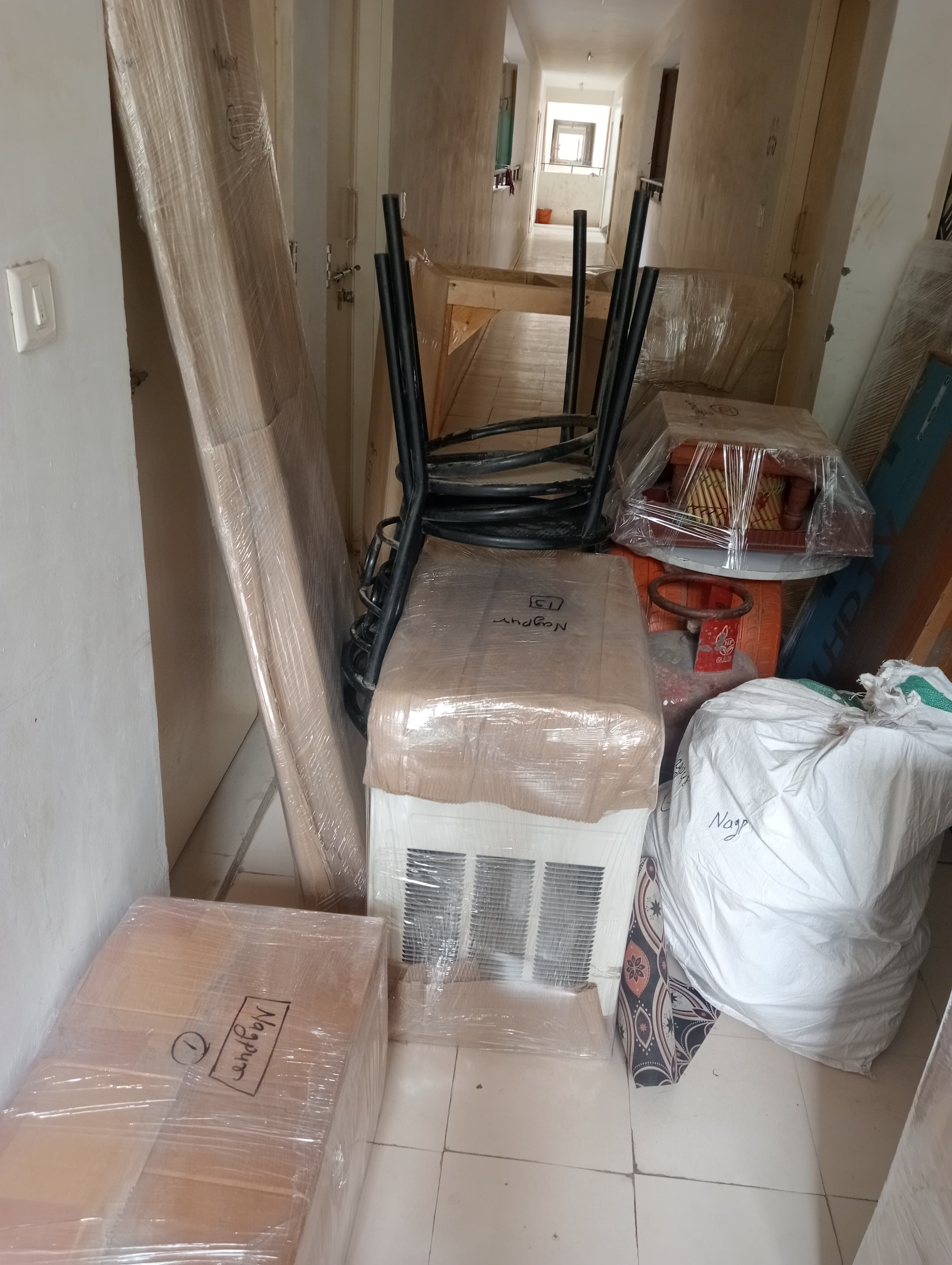 Team securing a glass table for transport