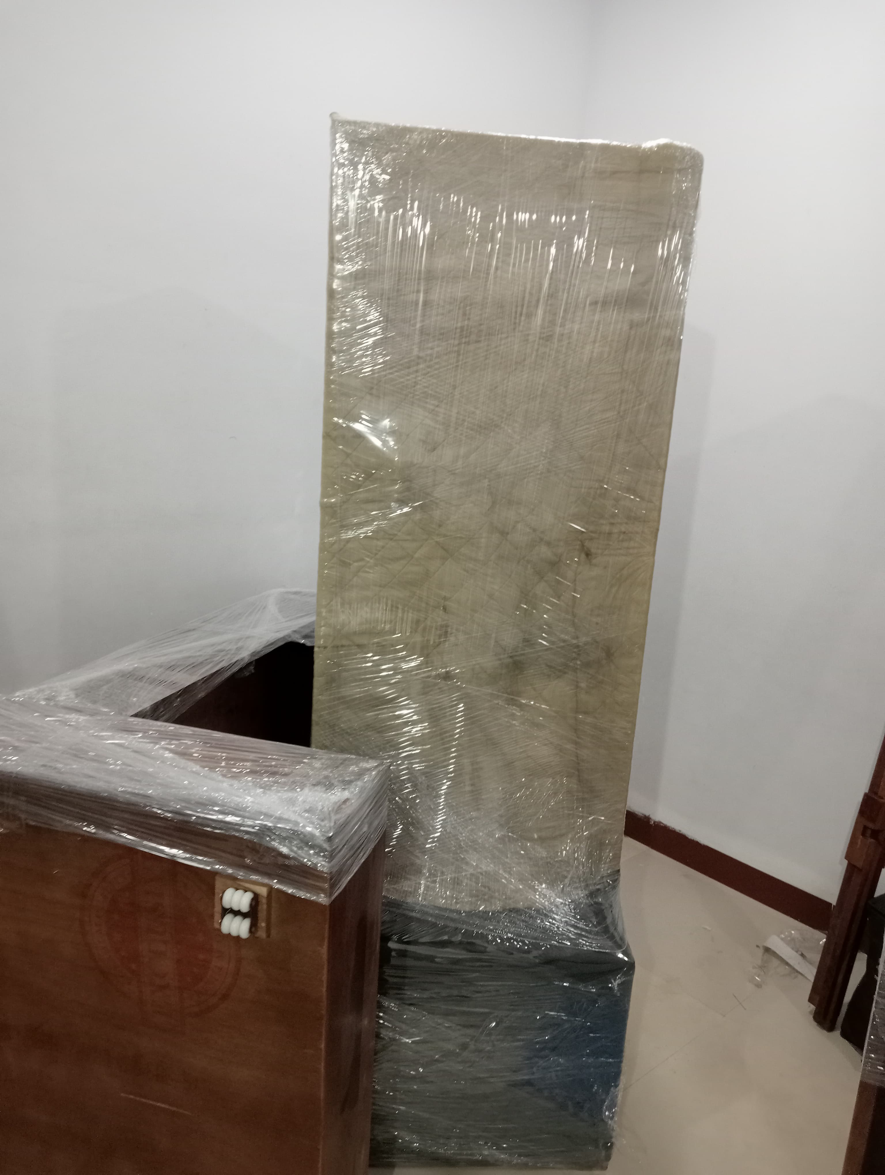 Unloading a bookshelf at a new residence