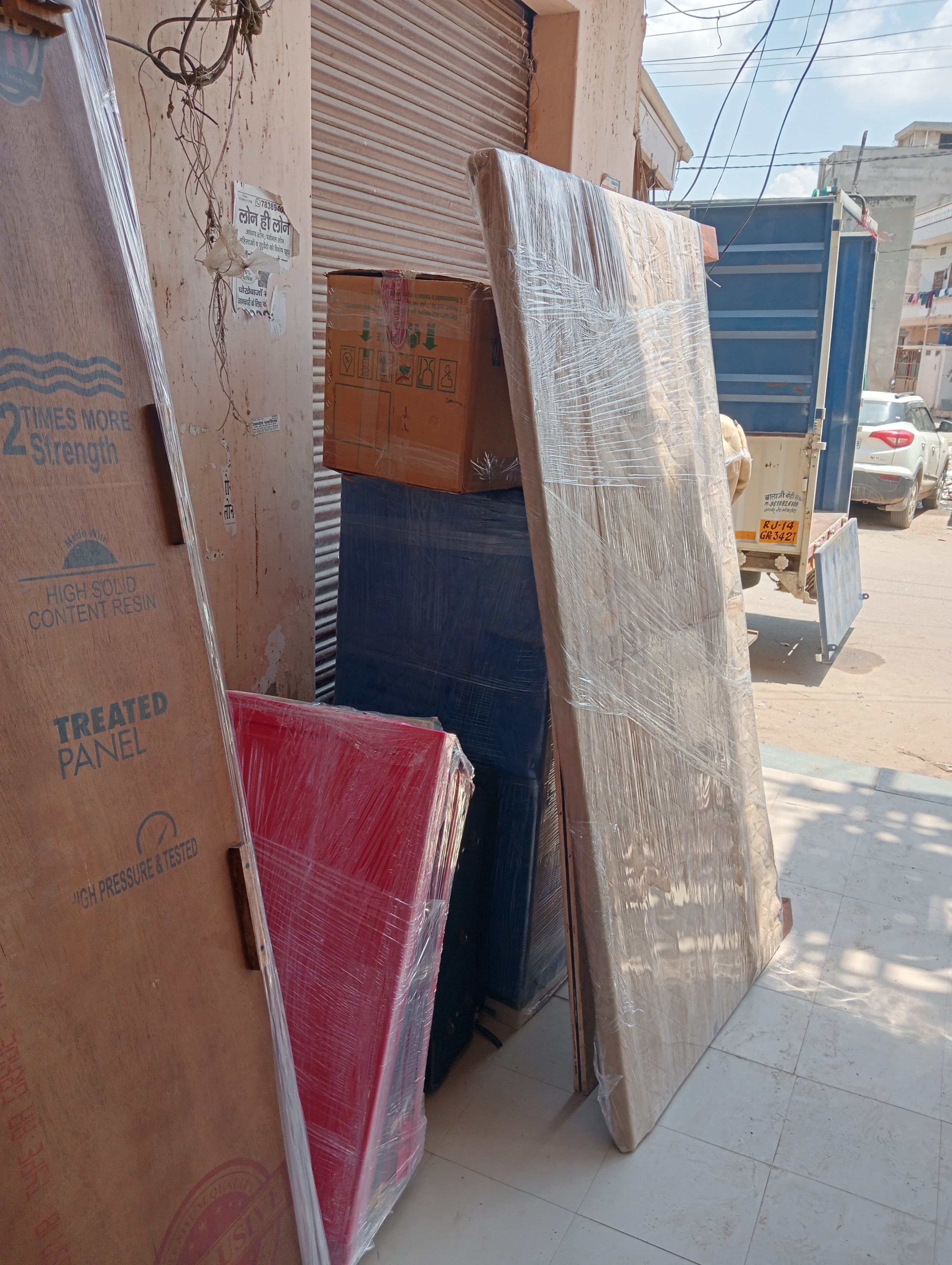 Unloading a couch at a new apartment